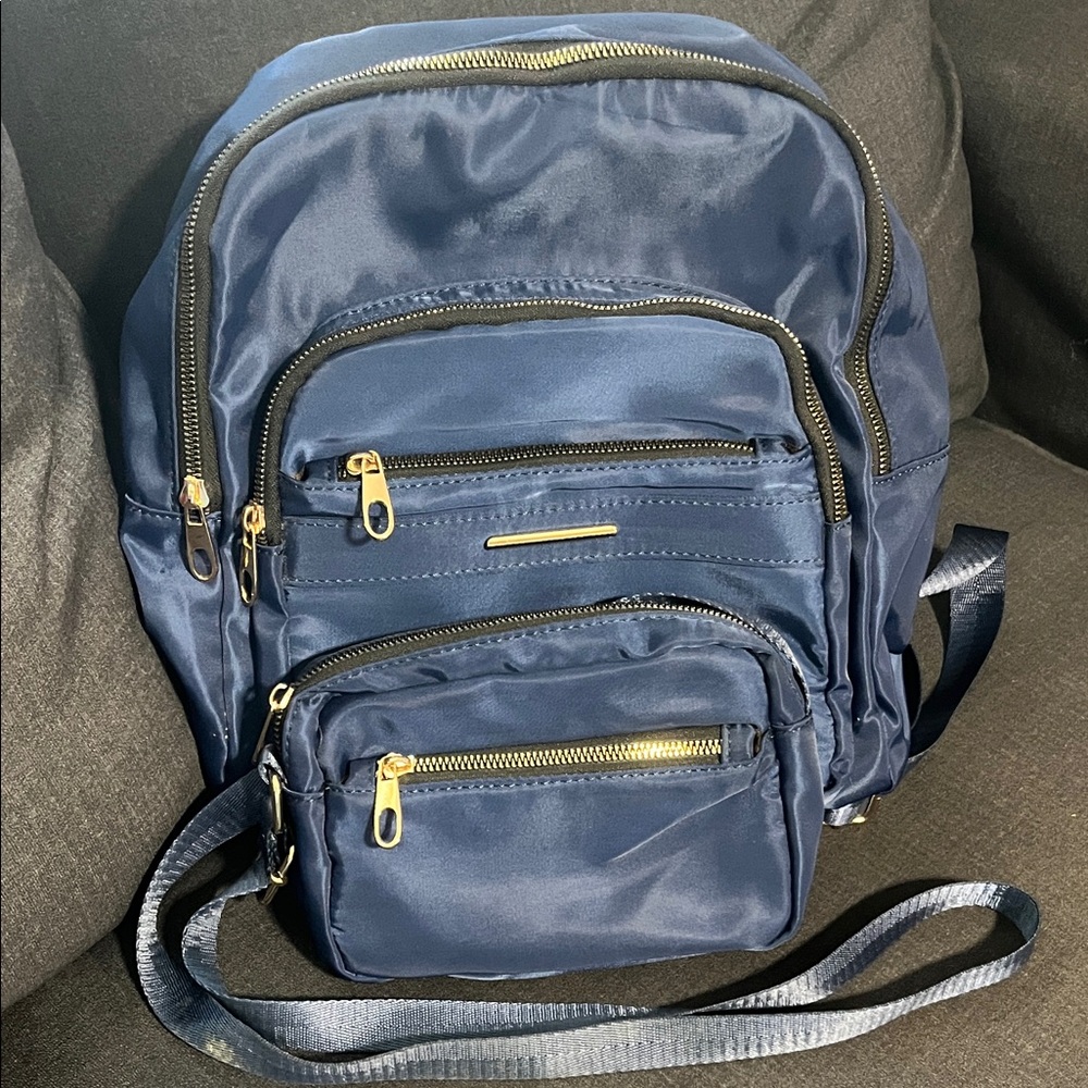 2 Piece Satin Navy Backpack and Crossbody with Gold Accents.